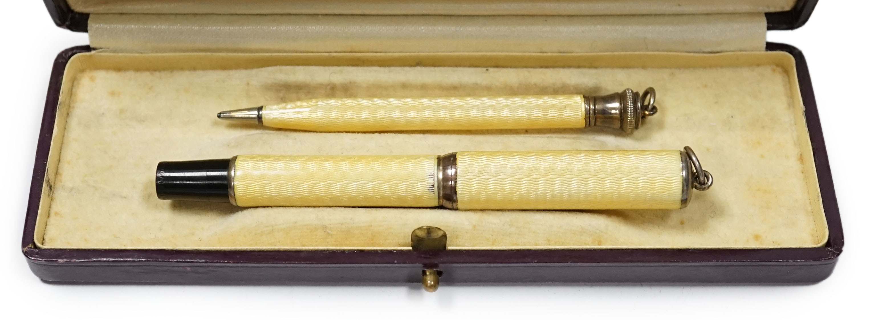 A rare Kaweco yellow enamel fountain pen and pencil set